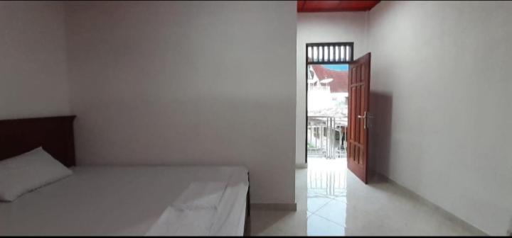 Toba Boi Hotel Tuk Tuk Kültér fotó